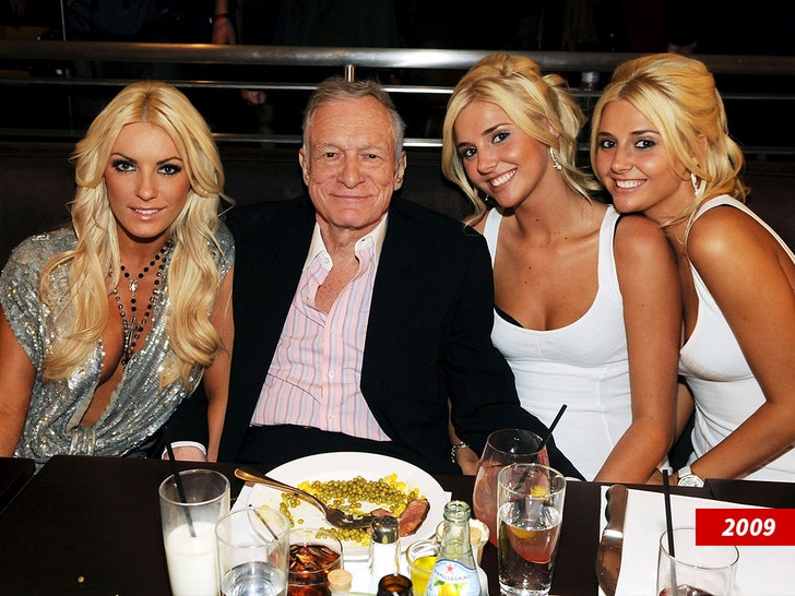 Crystal Hefner Hugh Hefner Kristina Shannon and Karissa Shannon getty