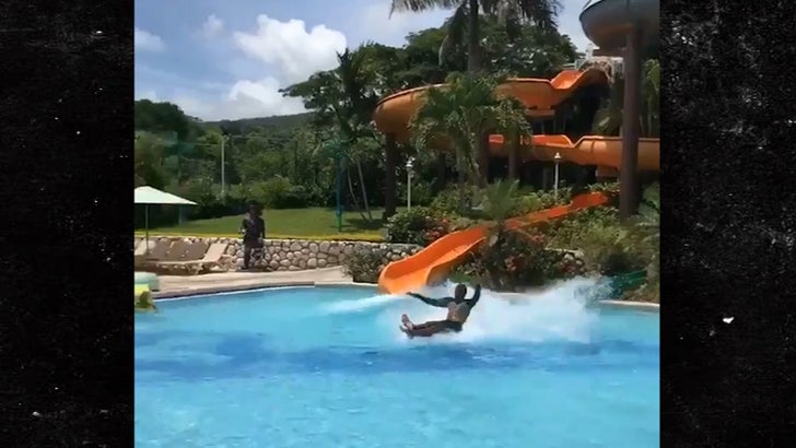 Water Slide Guy Sticks Landing by Gliding Over Water!