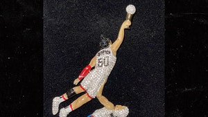 Aaron Gordon Memorializes Iconic Landry Shamet Dunk With Iced-Out Pendant