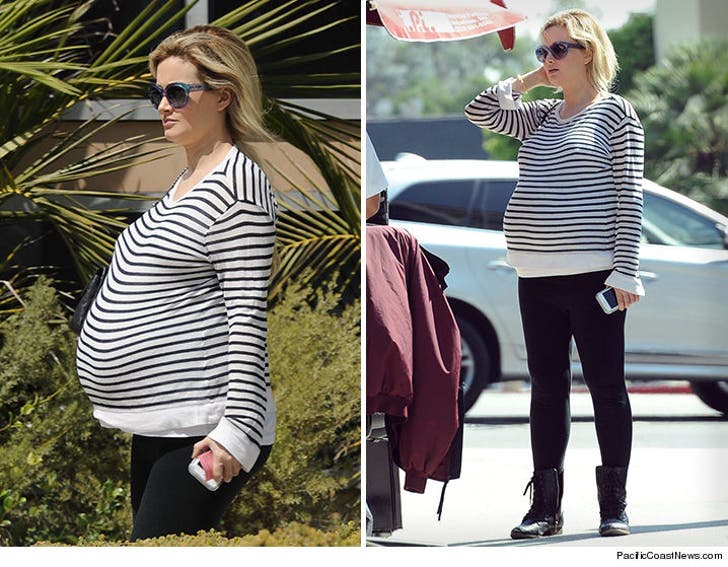 Holly Madison Looks Uncomfortably Pregnant