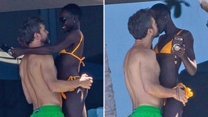 0307-Lupita-Nyongo-Joshua-Jackson-PDA-Kissing-Hugging-Vacation-Bikini-Photos-primary