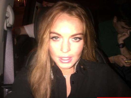 0829-lindsay-lohan-the-earrings