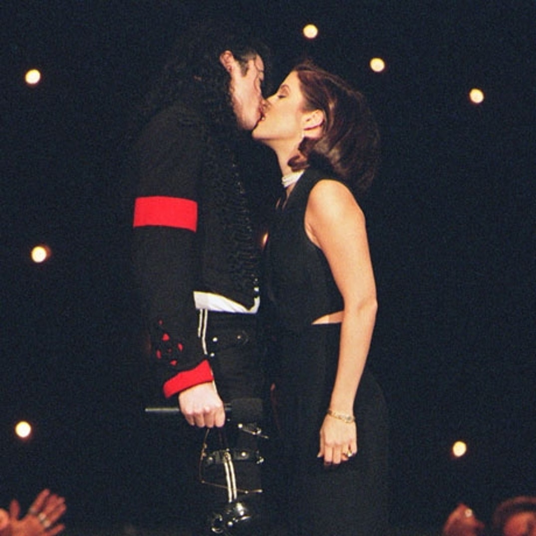 Michael Jackson and Lisa Marie Presley kiss. (1994)