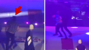 Justin Bieber Fan Rushes Stage While He Performs at Jingle Bell Ball