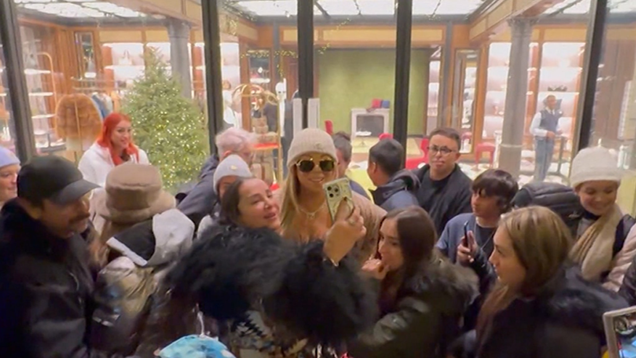 Mariah Carey Gets Swarmed By Fans at Gucci Store in Aspen