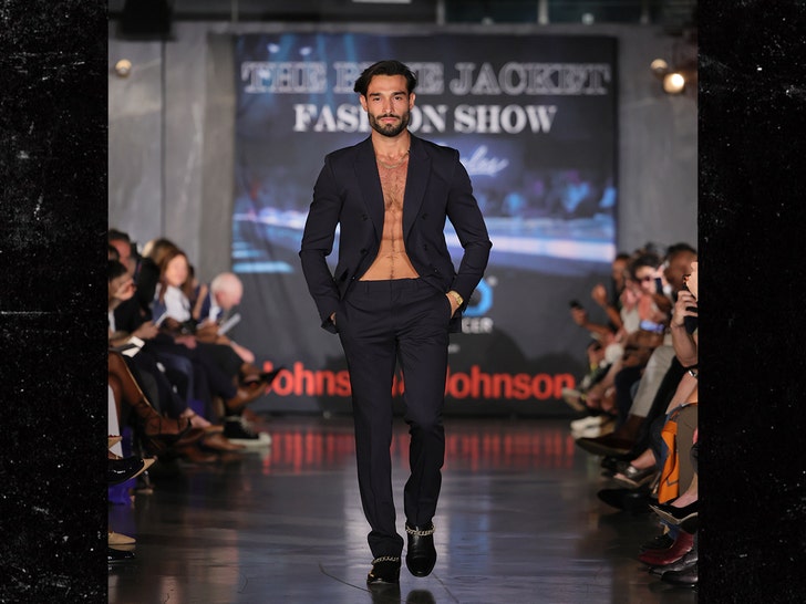 Sam Asghari walks the runway for the Blue Jacket Fashion Show getty 3