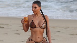 Kim Kardashian Shows Off Snake-Print Bikini in Malibu