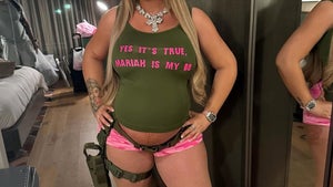 0413-latto-baby-bump-guess-who-primary_720