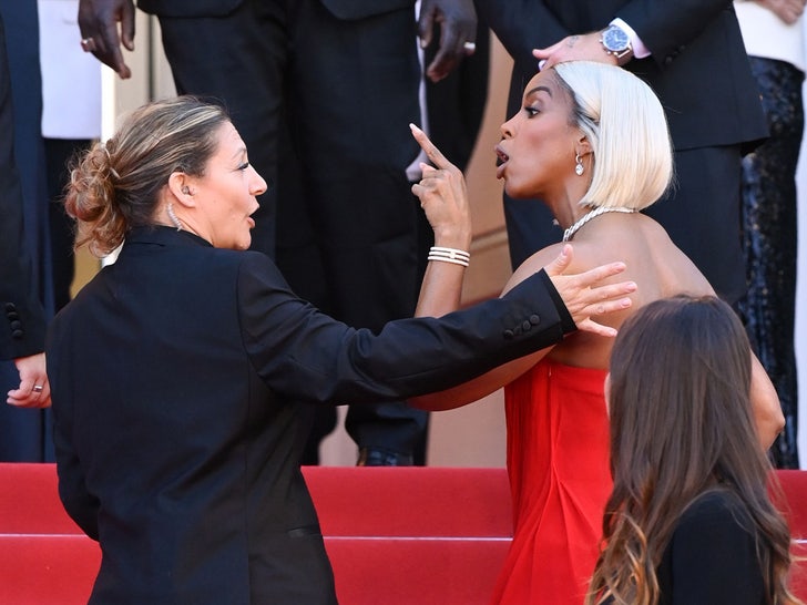 Kelly Rowland discutindo com segurança em Cannes