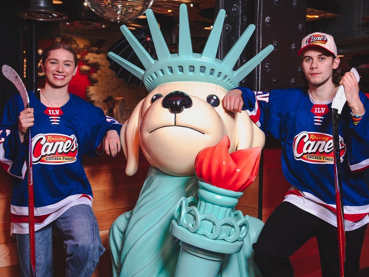 Jack Hughes and Caroline Harvey at Raising Cane’s Global Flagship in Times Square