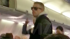 Macklemore Thrift Flying -- That's a Bargain Bitch! [PHOTO]