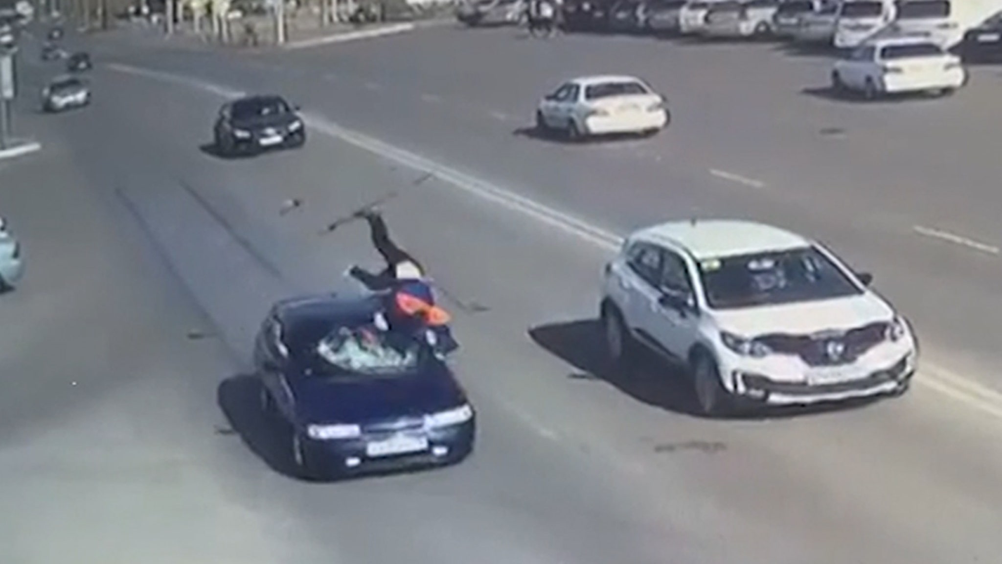 Speeding Car Hits Pedestrian, Sends Man Flying Into the Air, on Video