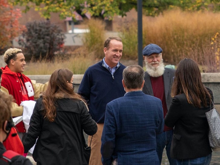 Peyton Manning Hits Beer Cans Off Statues With David Letterman
