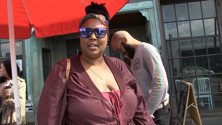 Lizzo says Tommy Hilfiger has connected with her on a future collab, and the article of clothing she thinks they can peddle best ... butt cheek dental floss.