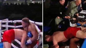 two boxers crash into announcers table 1