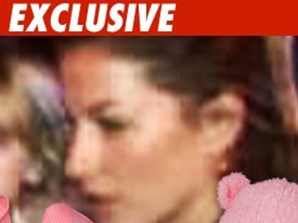 Gisele Bundchen-- Baby Girl on Board?