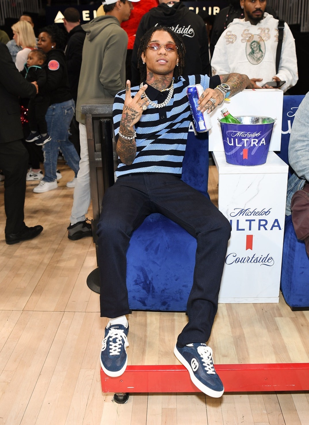 Swae Lee sets up shop front and center for the game between the Jazz and the  Hawks at State Farm Arena on April 06, 2025 in Atlanta