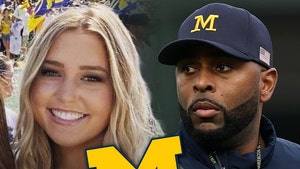 sherrone moore and paige shiver getty 1