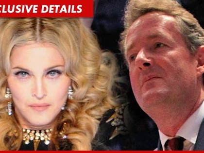 0327-madonna-piers-morgan-getty-EXD