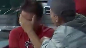 L.A. Angels Fan Gets Wrecked Chasing Foul Ball, Hit In Throat And Face!