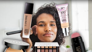 Woman Doing Her Makeup Surrounded By Amazon Cosmetics