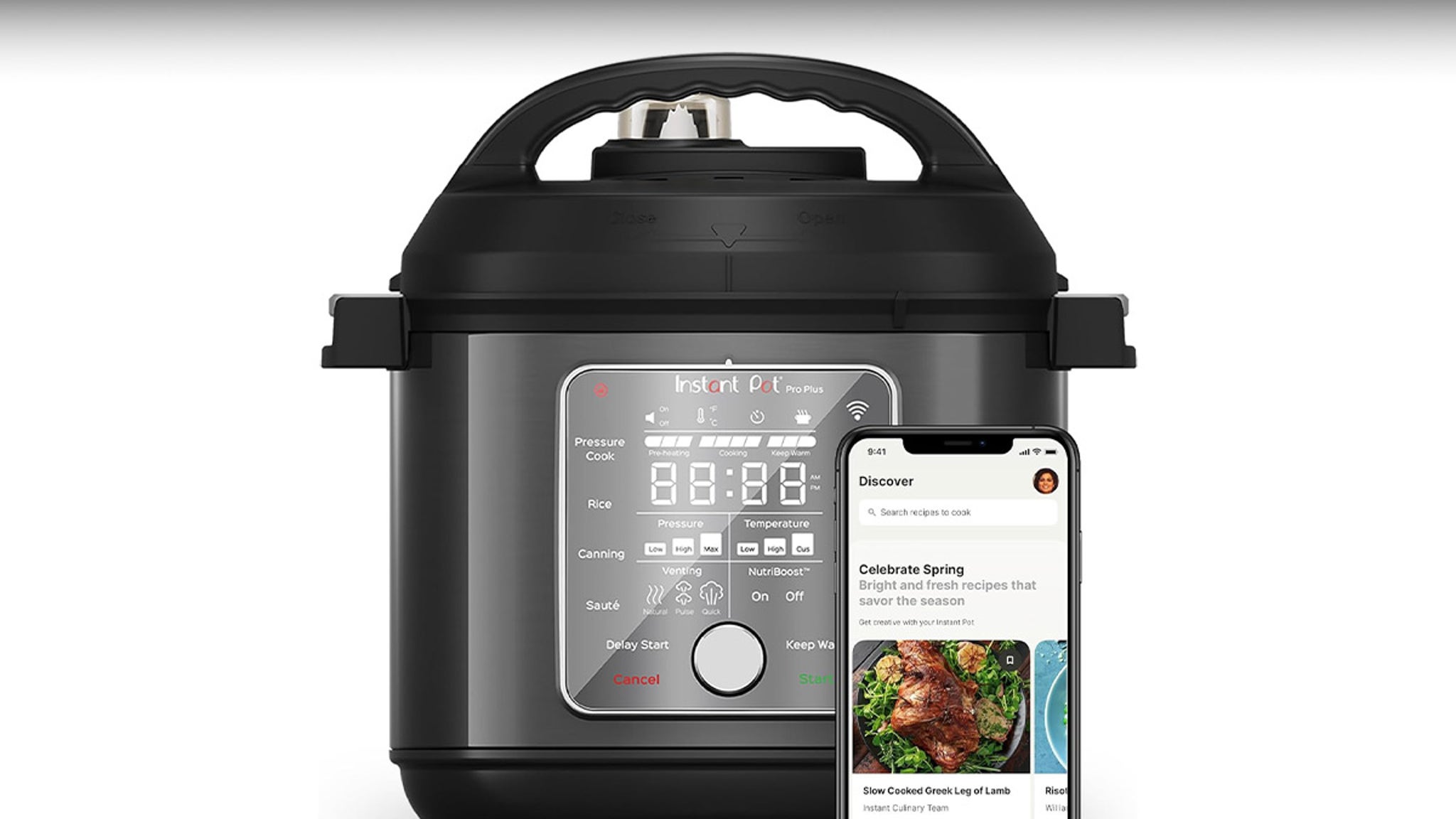 The image shows a modern Instant Pot Pro Plus, a multi-function electric pressure cooker, in a sleek black and stainless steel design. The front panel features a digital display with various cooking options such as Pressure Cook, Rice, Canning, and Sauté, along with buttons for adjusting pressure, temperature, venting, and NutriBoost settings. Next to the Instant Pot, a smartphone screen is visible displaying a recipe app with sections like 'Discover' and 'Celebrate Spring,' showcasing a photo of a slow-cooked Greek leg of lamb dish.