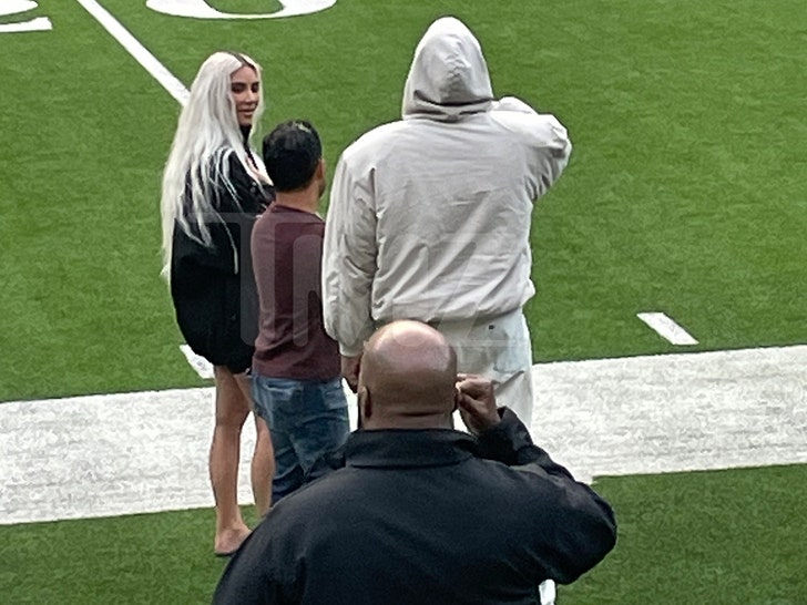 b459cc30777a48a2ac21e89662e3c09d_md Kim Kardashian and Kanye West Attend Saint's Football Game, Chat on Sidelines