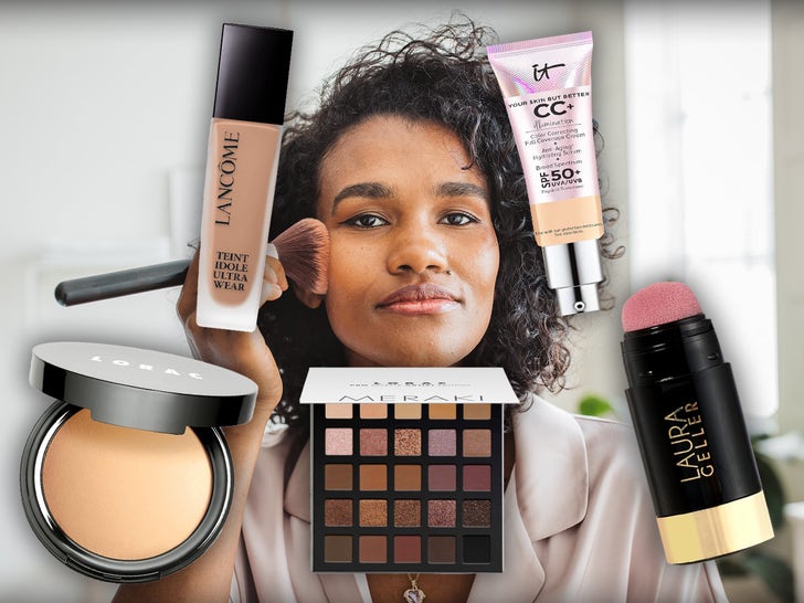 Woman putting on makeup, surrounded by Amazon cosmetics