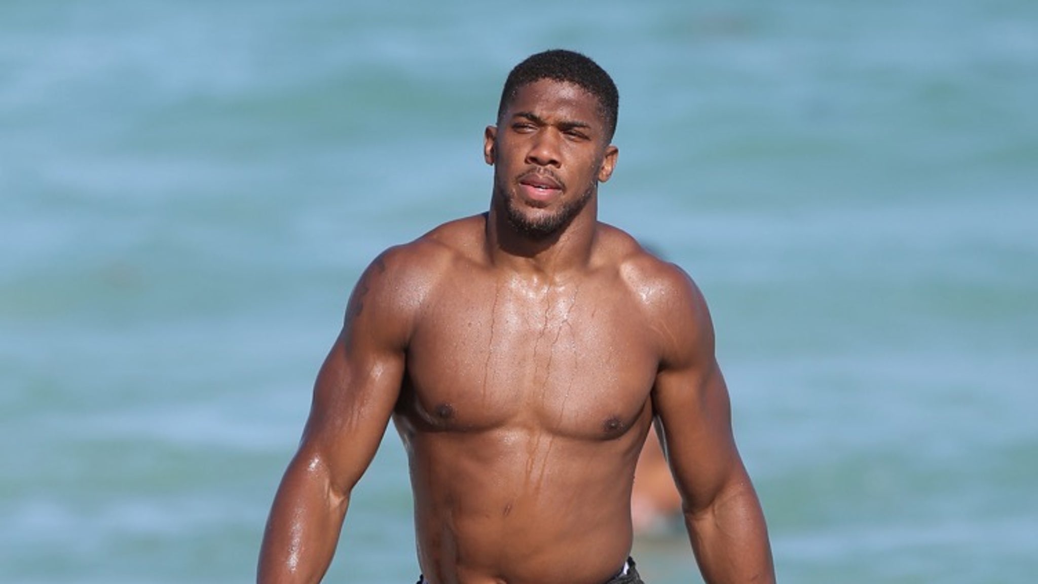 Topless Anthony Joshua leaves Playboy bunny and ring girl in awe as boxer  shows off bulging muscles