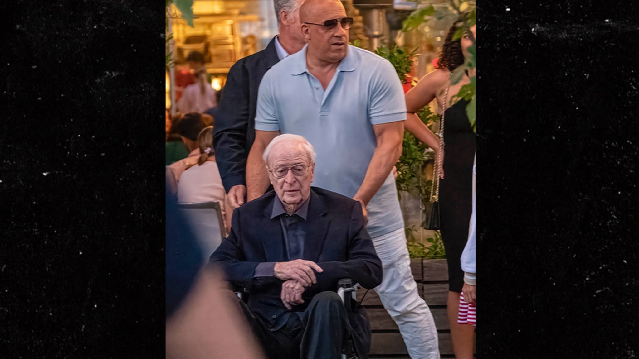 Vin Diesel Pushes Michael Caine in Wheelchair at Dinner in London