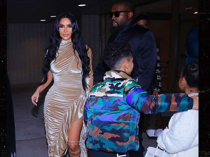 1223 kim and kanye leaving orchastra SPLASH