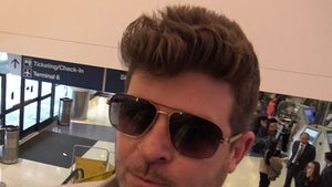 Robin Thicke Pained Face Tells Custody War Story (VIDEO)