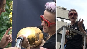 Team USA Women Pop Big Bottles of Champagne at World Cup Victory Parade