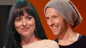 chris martin and Dakota Johnson