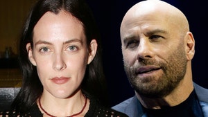 Riley Keough john travolta getty comp