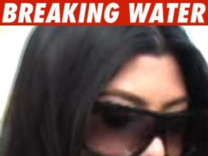 1214_kourtney_kardashian_bw_tmz_01-1