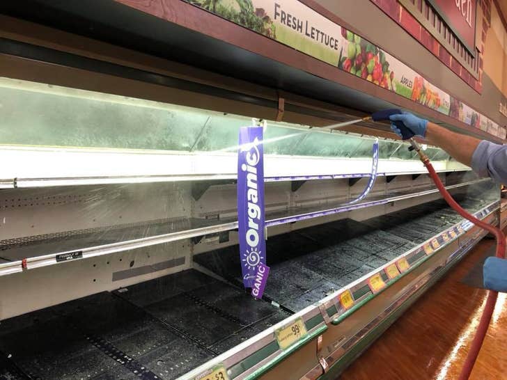 Gerrity's Supermarket Cleaning Shelves