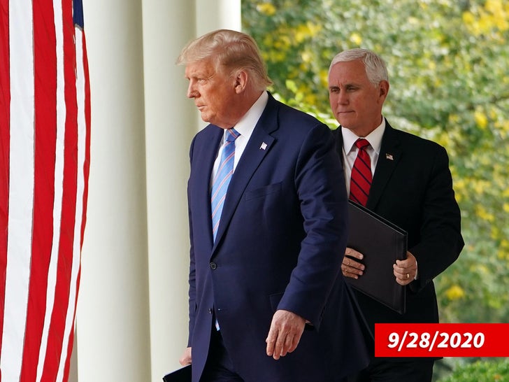 President Donald Trump and  Vice President Mike Pence arrive to speak on Covid-19 testing in the White House's Rose Garden in Washington, D.C. on September 28, 2020.