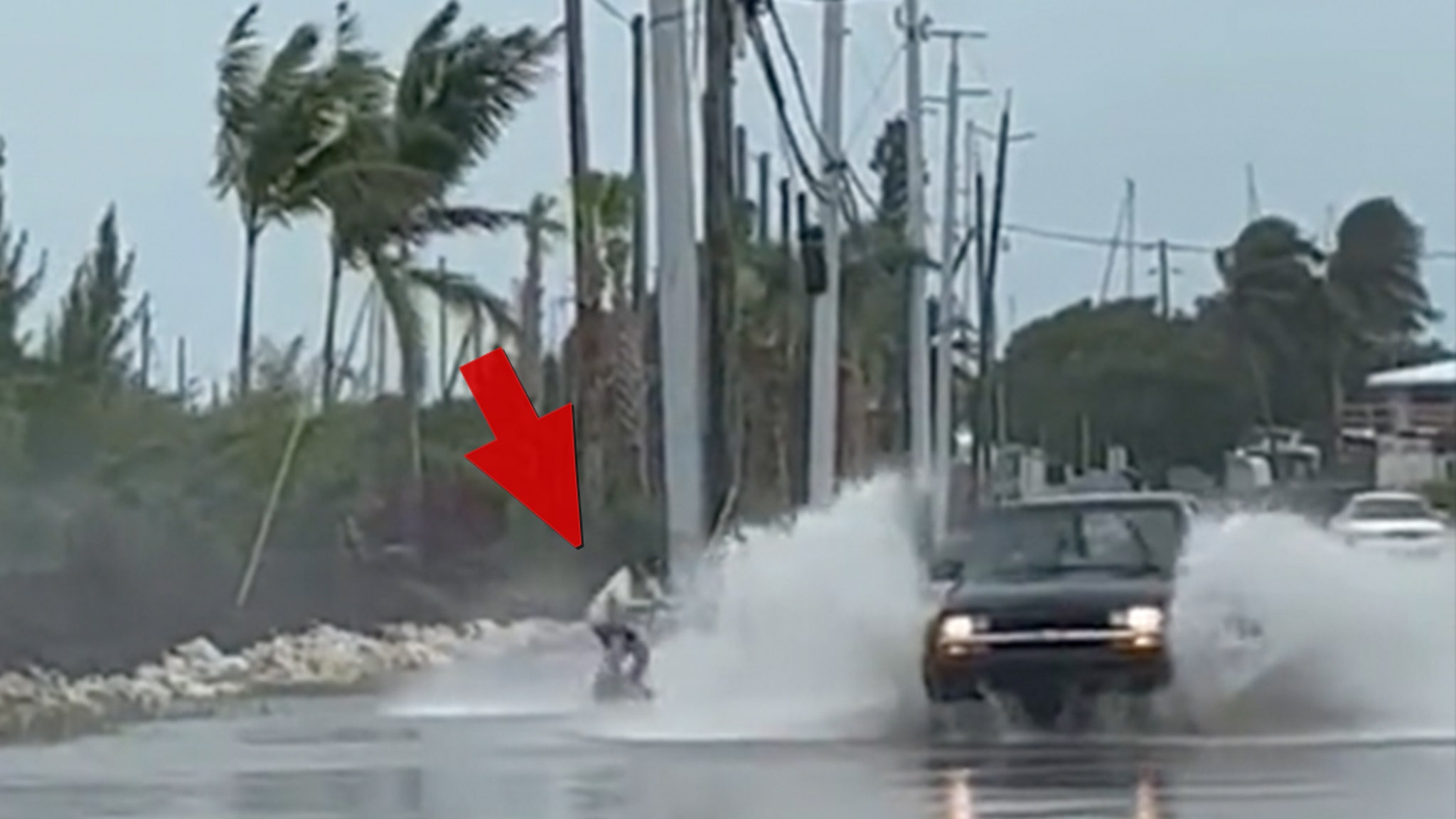 Florida Man Goes Wakeboarding In Flooded Street During Hurricane Ian