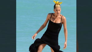 10 INSANE Photos of V.S. Angel Doutzen Kroes At The Beach That'll Make You Hang Five