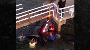 Woman Rescued After Car Falls Off Dock Into Water at Newport Beach