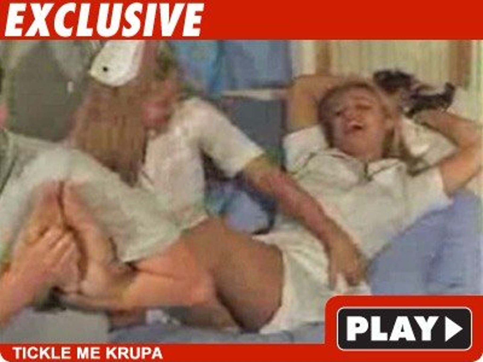 Joanna Krupa Tickled Pink in Fetish Video