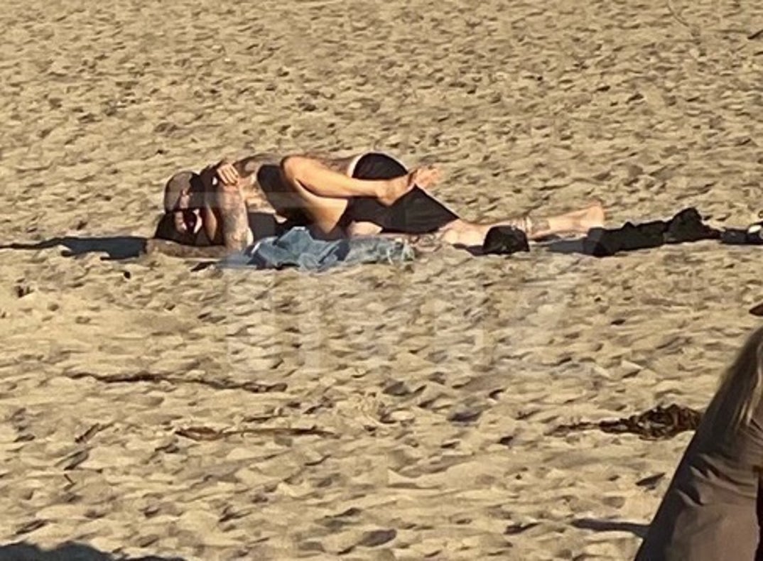 Kourtney Kardashian and Travis Barker Making Out In Public At Beach