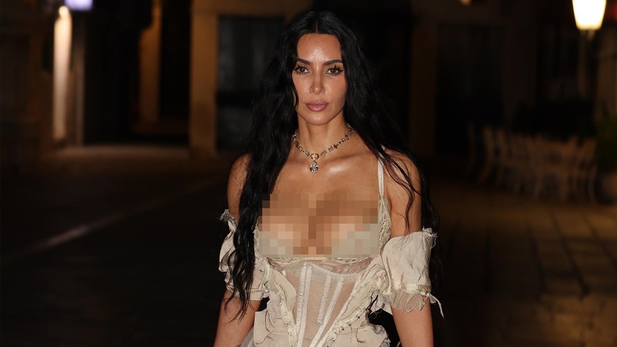 Kim Kardashian Bares Cleavage in Tiny Lingerie in Venice