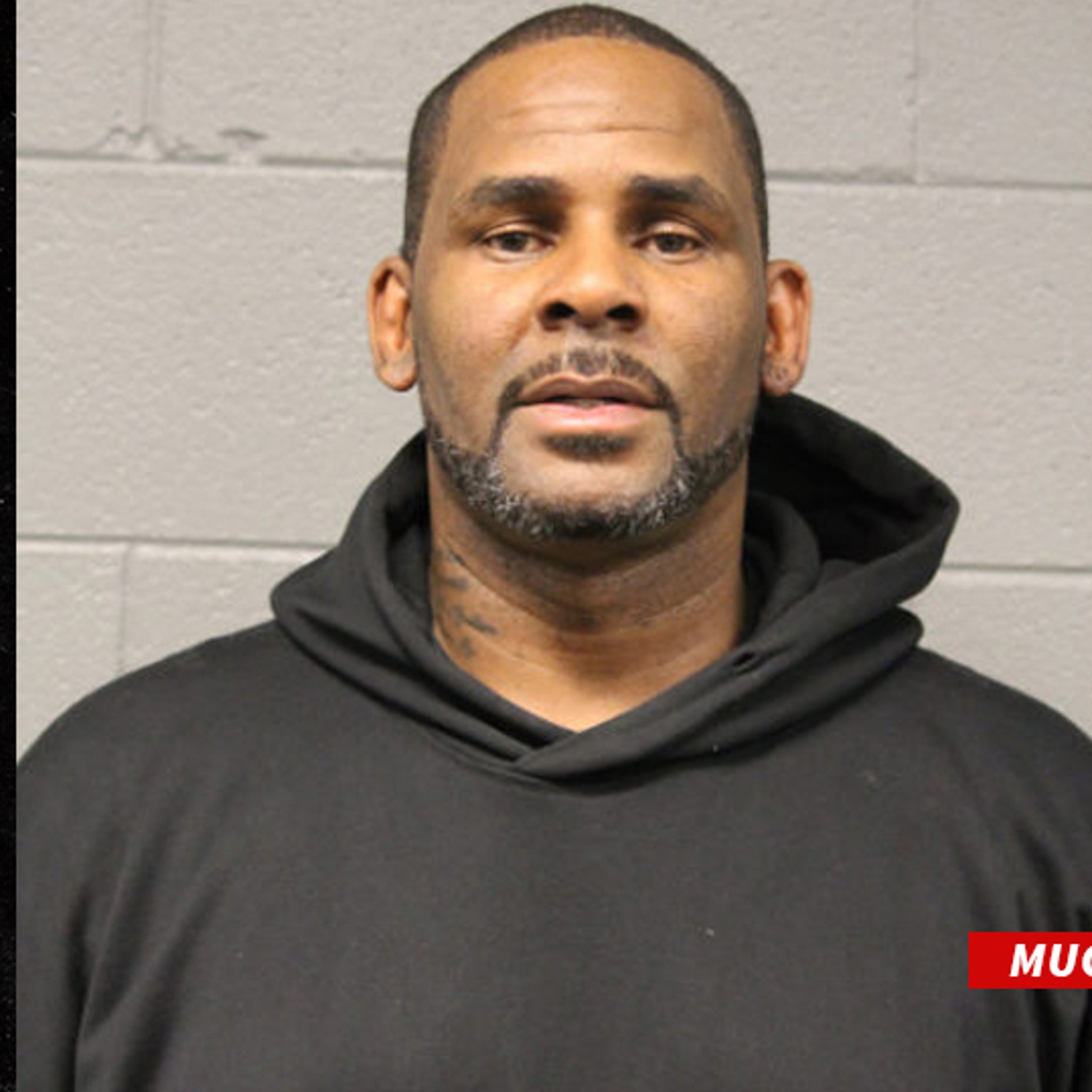 R. Kelly Turns Himself In and Mug Shot Released After Sexual Abuse Arrest