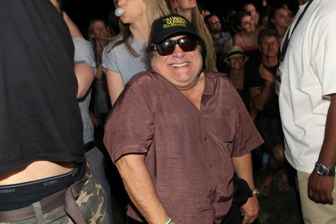 2011: Danny DeVito laughs in the audience during Day 2