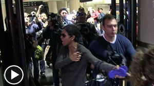 Halle Berry -- Restrains Olivier During Explosive Altercation with Paps
