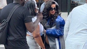 Cardi B Covered Up By Lots of Umbrellas While Stepping Out in NYC