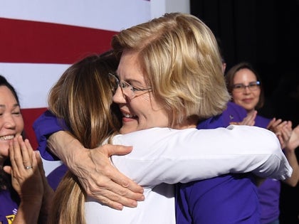 Elizabeth Warren hugs an attendee after speaking at the National Forum on Wages and Working People: Creating an Economy That Works for All at Enclave on April 27, 2019 in Las Vegas, Nevada.