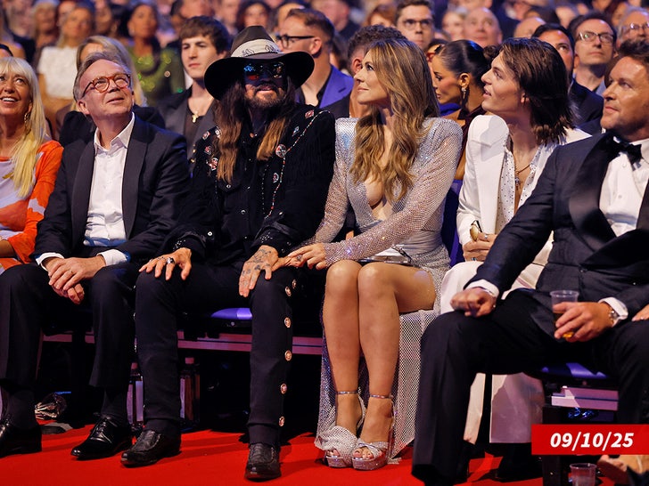 elizabeth hurley billy ray cyrus sub getty swipe 1